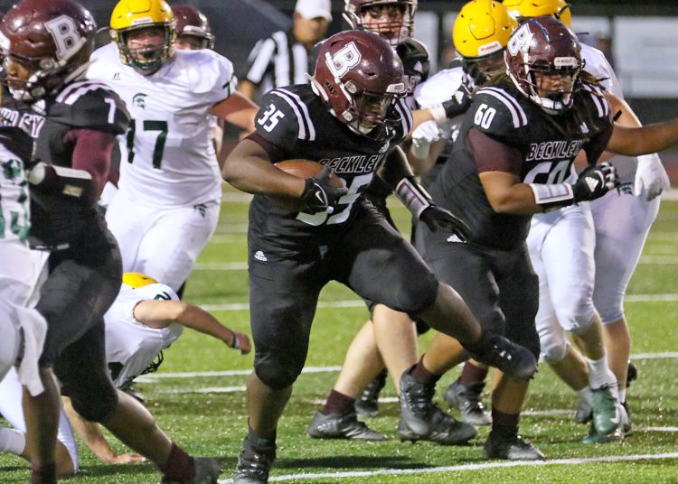 (Brad Davis/For LootPress) Woodrow Wilson's Matthew Moore rumbles ahead for a big gain against Greenbrier East Friday night in Beckley.