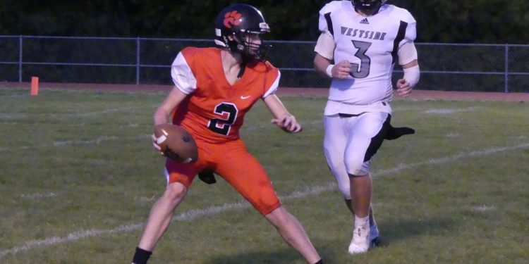 PikeView's Peyton Greer eludes a tackle during a game against Westside on Oct. 4.