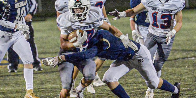 Independence’s Judah Price picks up big yards against Nicholas County during Friday action in Summersville. (F. Brian Ferguson/Lootpress).