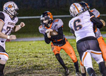 Summers County’s Benjamin Lane picks up yards against Richwood during Friday action in Hinton. (F. Brian Ferguson/Lootpress)