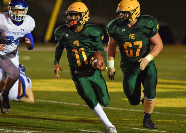 Greenbrier East's Monquelle Davis carries the ball against Princeton on Oct. 29 in Fairlea. (Greg Barnett/Lootpress)