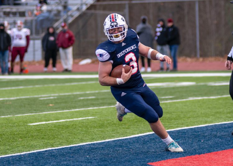 Atticus Goodson scores on a touchdown run Nov. 26 against Bluefield in the Class AA semifinal in Coal City. (Heather Belcher/Lootpress)