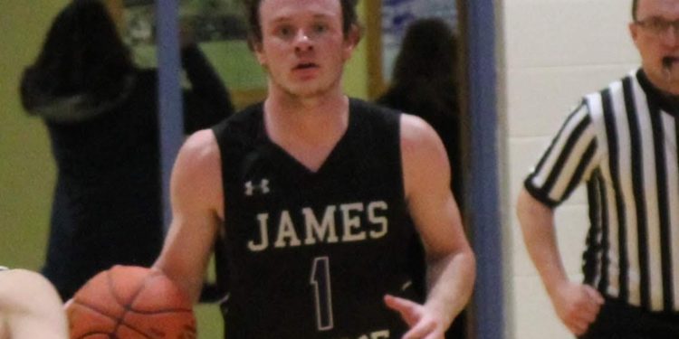 James Monroe's Shad Sauvage advances the ball during a game against Greenbrier West on Feb. 1 

(File photo/Steph Redden)