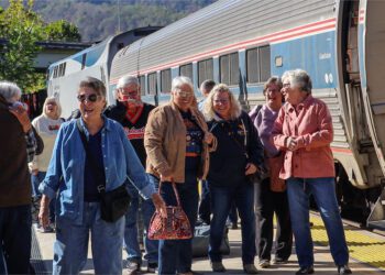 Dozens arrive to Hinton Railroad Days by train.