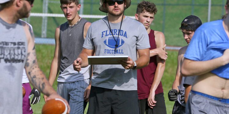 (Brad Davis/For LootPress) Westside head coach Justin Cogar watches his players as they work through drills during practice June 15 in Clear Fork.