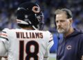 Chicago Bears quarterback Caleb Williams (18) talks with head coach Matt Eberflus during the second half of an NFL football game in Detroit, Thursday, Nov. 28, 2024. (AP Photo/Duane Burleson)