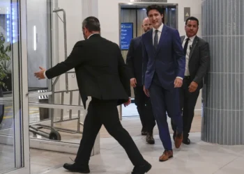 Canadian Prime Minister Justin Trudeau walks through the 3 lobby of the Delta Hotel by Marriott, Friday, Nov. 29, 2024, in West Palm Beach, Fla. (AP Photo/Carolyn Kaster)