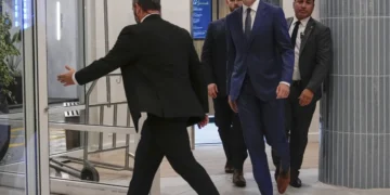 Canadian Prime Minister Justin Trudeau walks through the 3 lobby of the Delta Hotel by Marriott, Friday, Nov. 29, 2024, in West Palm Beach, Fla. (AP Photo/Carolyn Kaster)